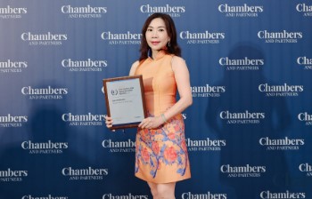 Grace receiving 2026 Law Firm of the Year Award